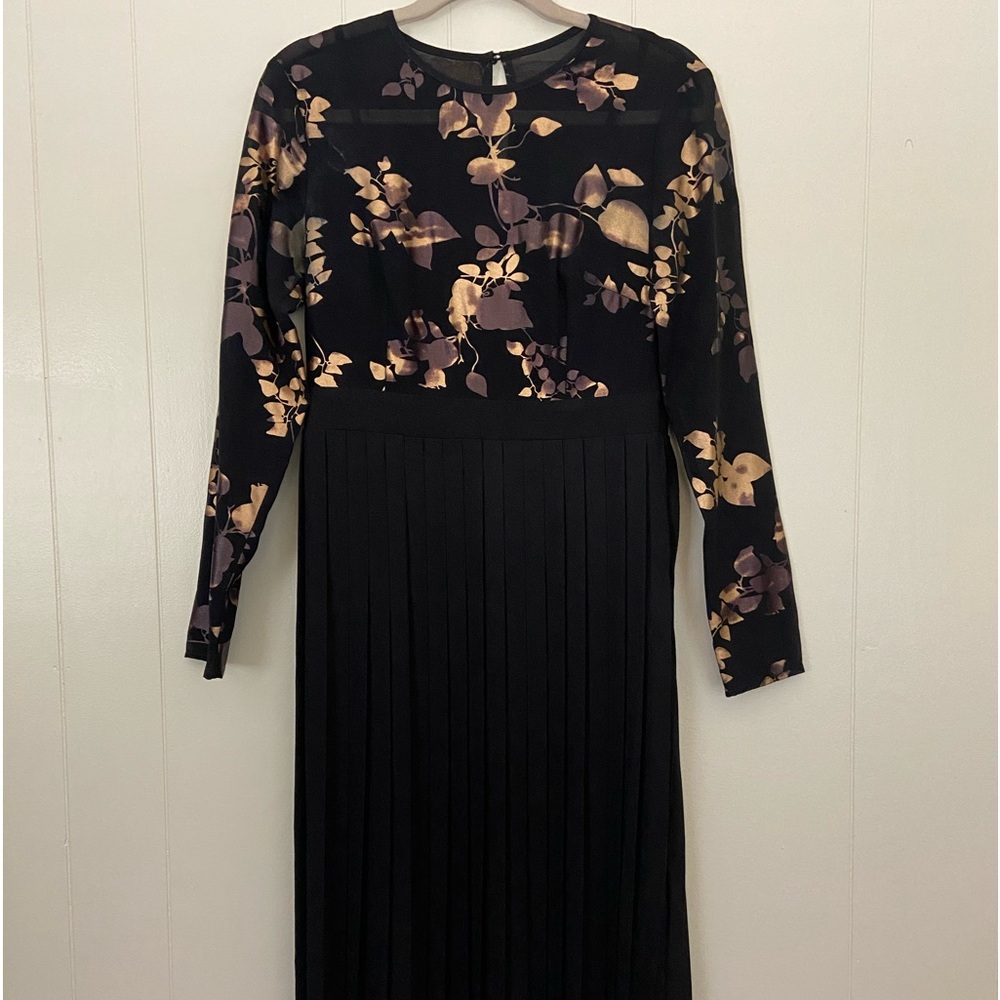 Pleated black dress in excellent pre-worn condition.
